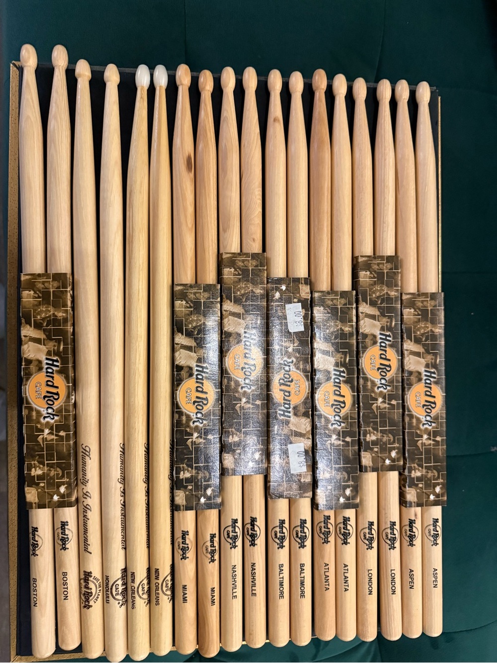 Hard Rock Cafe Natural Wood Drumsticks with Black and Orange Logo Sleeves